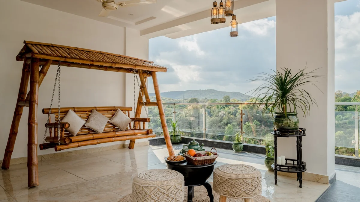 a porch with a swing bed and a table with a bowl of fruit on it Ilustração editorial secção 2 sobre como escolher
